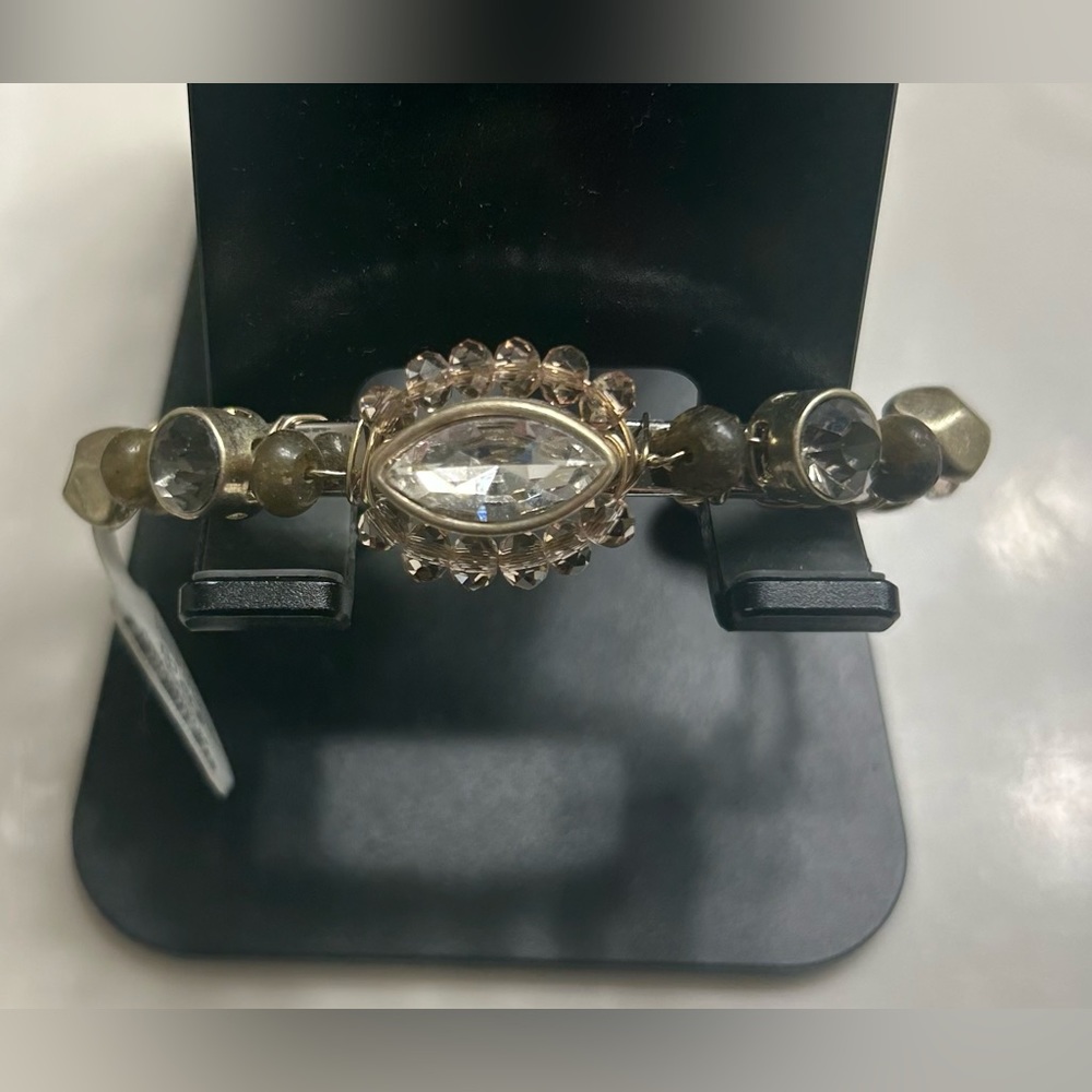 Chico’s gold Bangle bracelet.